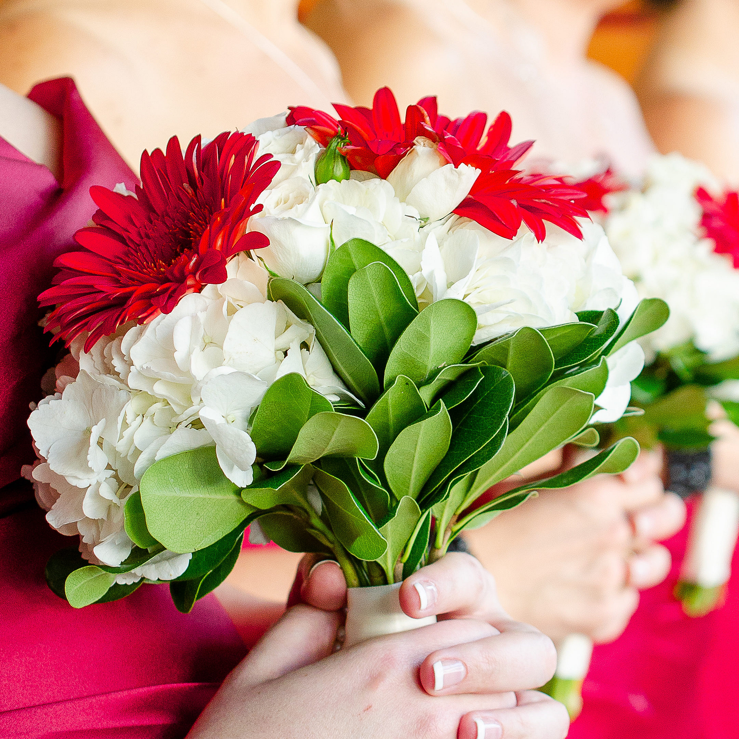 bridesmaid holding bouquets for weddings